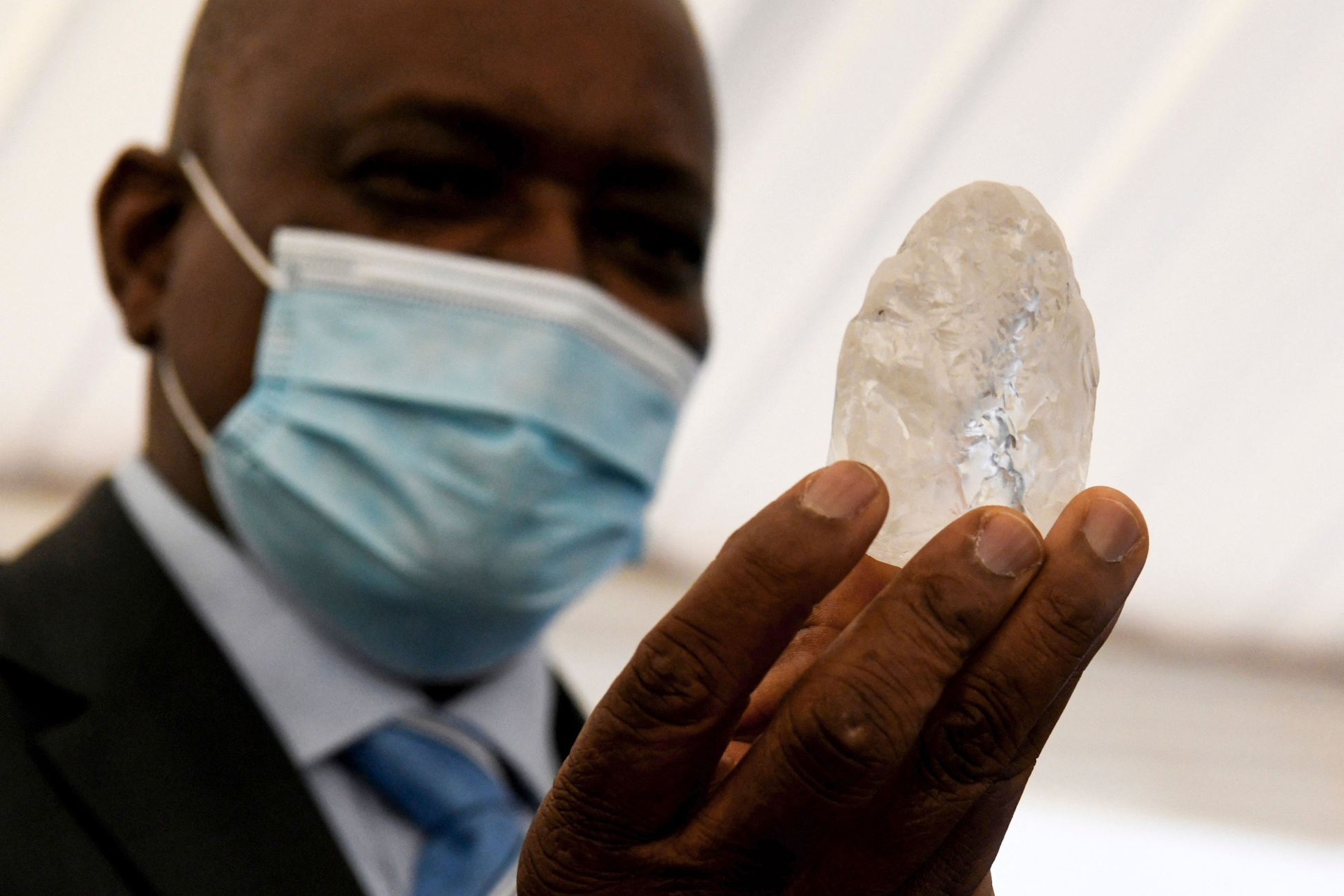 Large diamond on display, sparkling in bright light